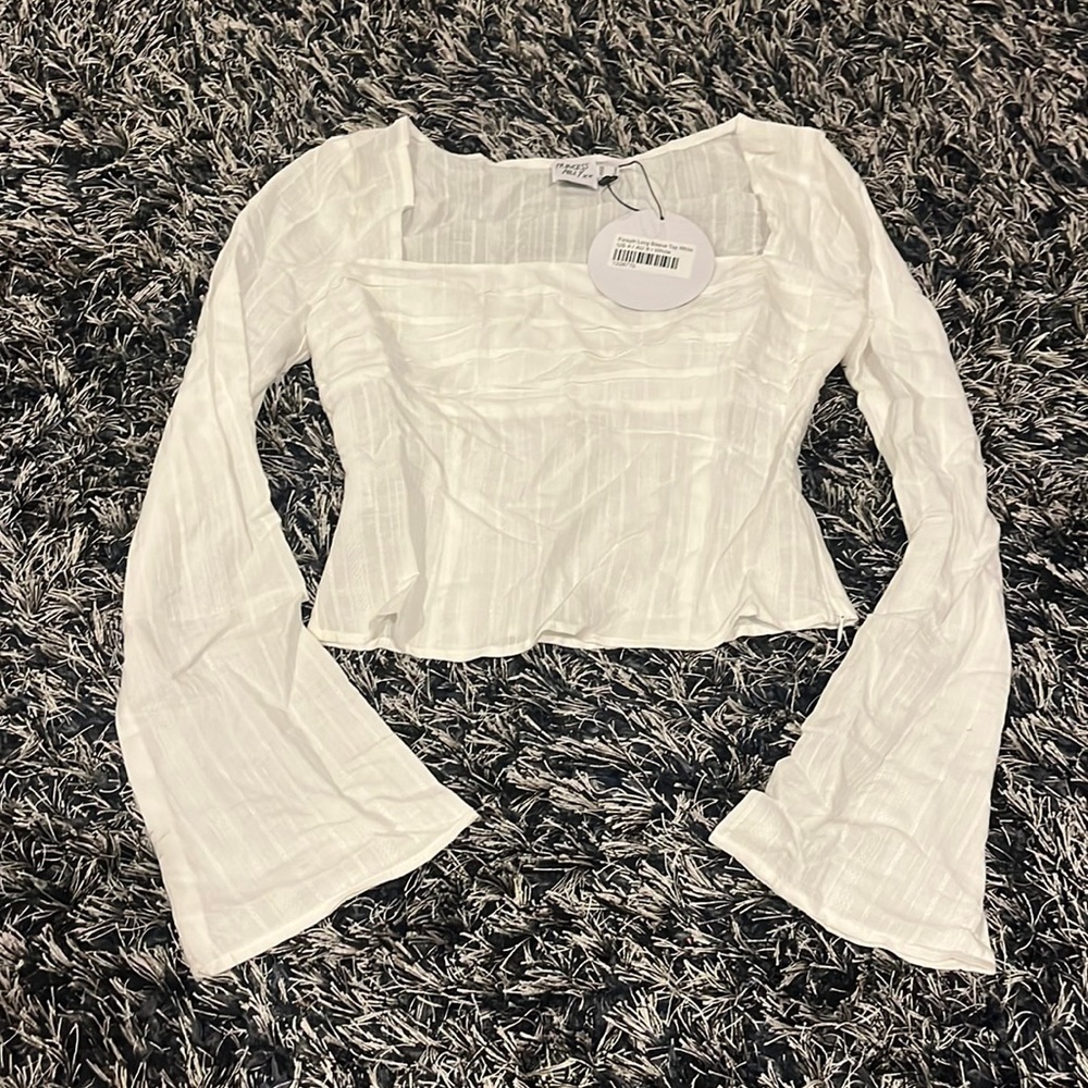 Women’s white long sleeve top